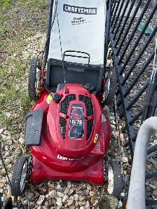 free lawnmower being picked up