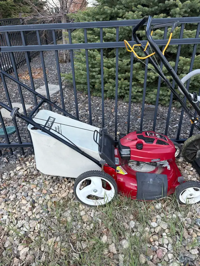 free lawnmower being picked up - Photo 2