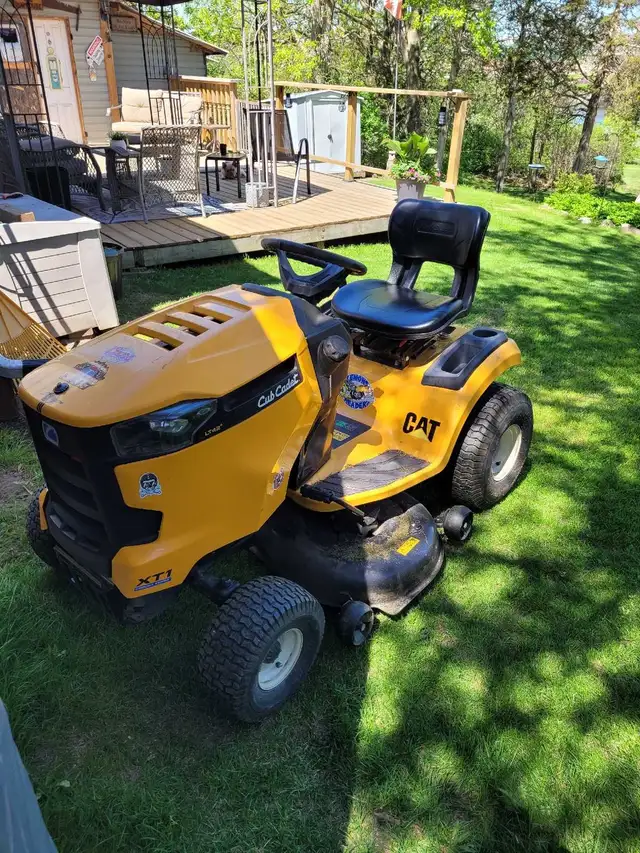 Guy With Riding  Lawn Mower