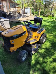 Guy With Riding  Lawn Mower
