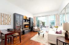 FURNISHED  EXECUTIVE 1BR DEN w GARDEN PATIO in PRIME LOCATION