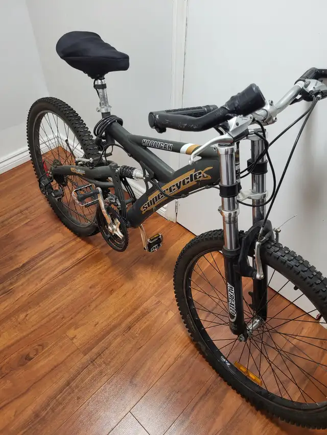 SUPERCYCLE HOOLIGAN 21 SPEED DUAL SUSPENSION MOUNTAIN BIKE.