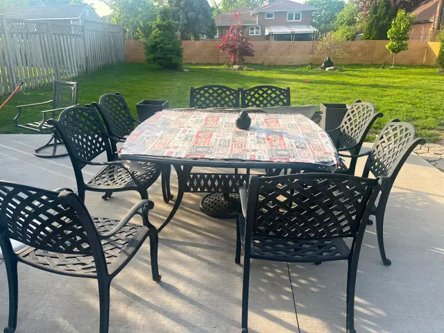 8 seats wrought iron patio table with seat cushions  …… $700.00 - Photo 2