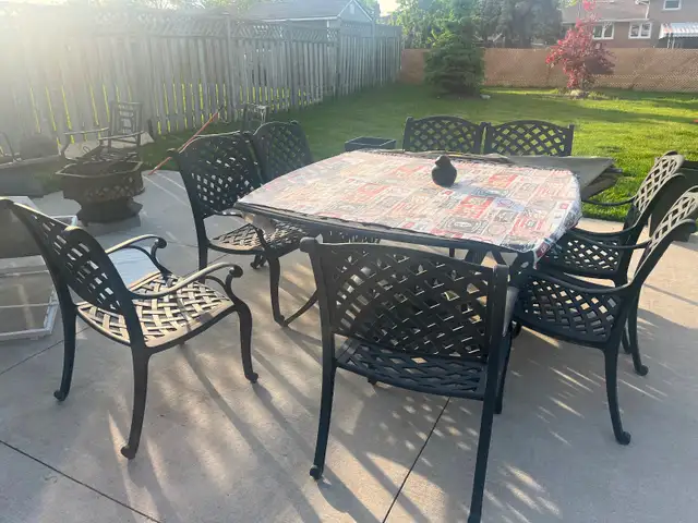 8 seats wrought iron patio table with seat cushions  …… $700.00 - Photo 3