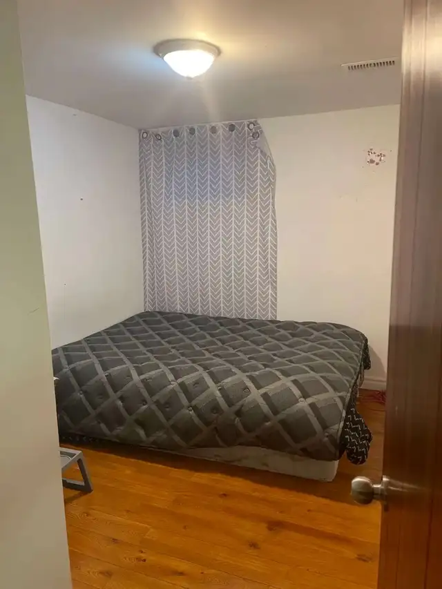 A basement bedroom for rent at Finch/Warden - Photo 2