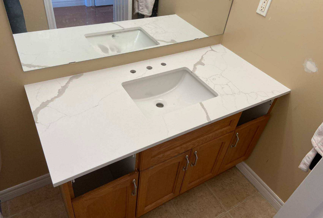 Quartz Countertop With Grey Veins Orange Island 437-522-8447