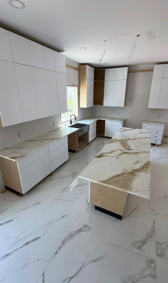 White Countertop With Treeish Golden Veins 437-522-8447 - Photo 6