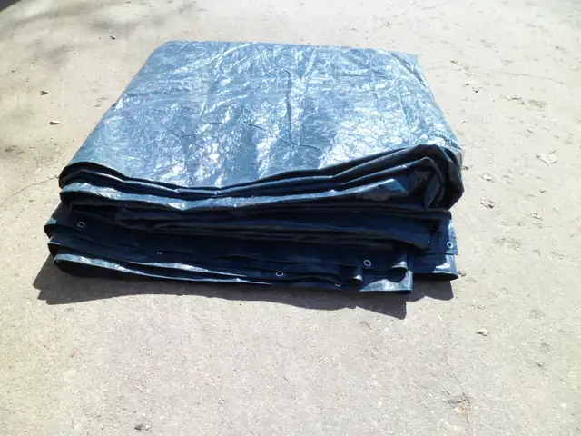 60 x 60 foot heavy tarp used once $175.00 OBO