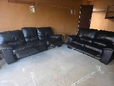 Used black leather recliner set. Free delivery & sofa disposal