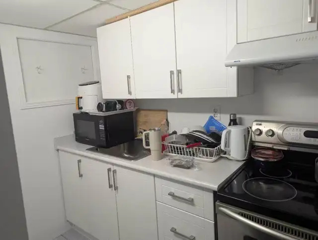 A basement bedroom for rent at Finch/Warden - Photo 3