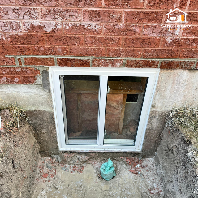 BELOW GRADE ENTRANCE DOOR-EGRESS WINDOW-SIDE ENTRANCE - Photo 5