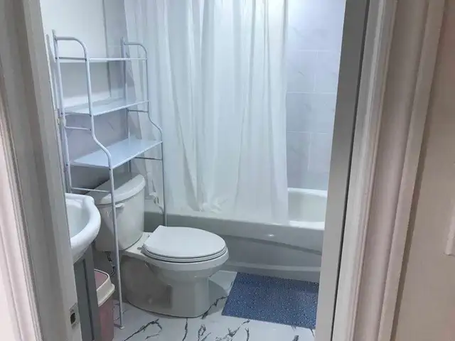Basement room for rent near Kennedy Subway - Photo 6