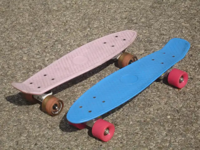 HAVE 2 PENNY SKATEBOARDS BLUE & PINK $20.00 EACH & FIRM!