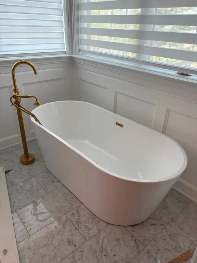 Tub and floor mount faucet