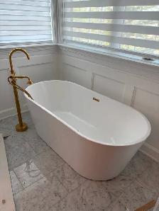 Tub and floor mount faucet