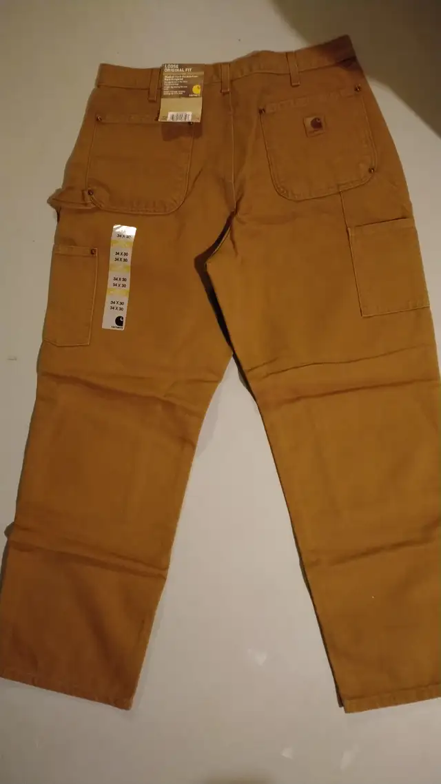 (34 X 30) Men's Work Pants_Loose Original Fit with company logo