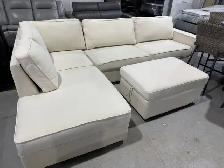 Cream fabric sectional with ottoman