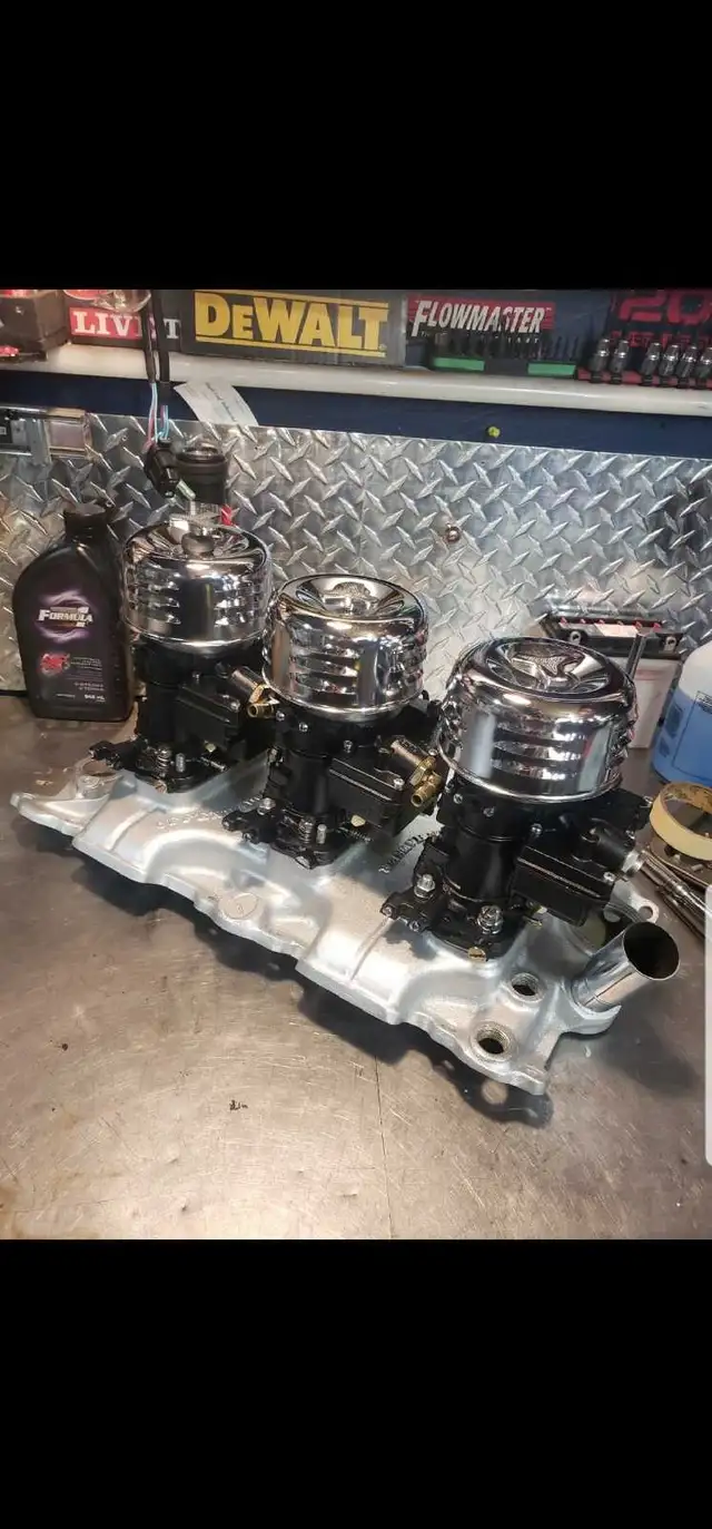CARBURETOR REBUILDING - Photo 2