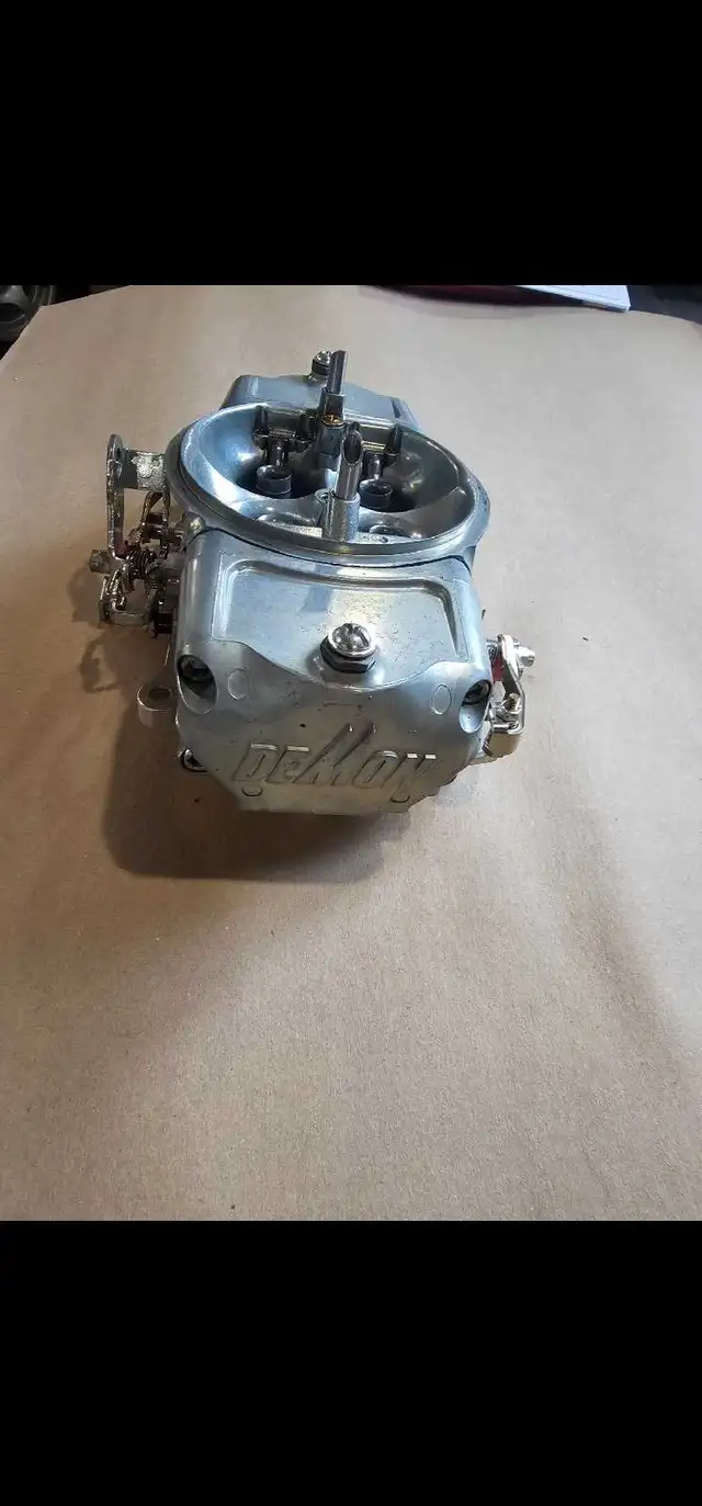 CARBURETOR REBUILDING - Photo 10