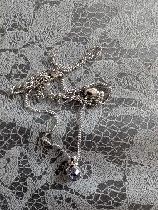 Silver-tone necklace with purple pendant - Photo 4