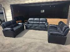 2 new black leather love seats & 1 sofa.Free delivery & disposal