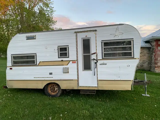 Vintage Retro Golden Falcon Camper