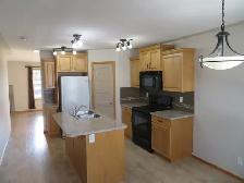 3 Bed / 2 Bath Main Floor Suite - Double Car Heated Garage - Photo 4