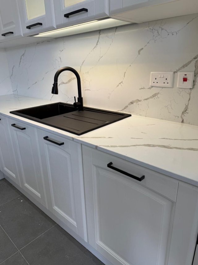 White Countertop With Grey Veins 437-522-8447