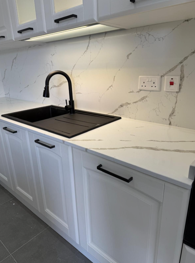 White Countertop With Grey Veins 437-522-8447 - Photo 5