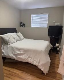 Quality  2-Bedroom Suite with Private Driveway & 6 Applian - Photo 5