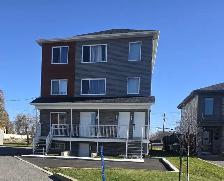 condo 5 1/2 a louer