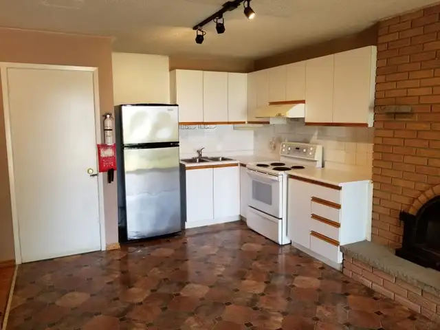 RARE nicely renovated 1 bedroom apt on the MAIN FLOOR of house - Photo 3