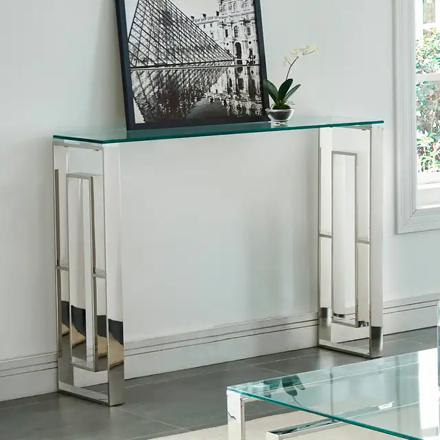 BRAND NEW EROS CONSOLE TABLE IN SILVER AND GLASS.