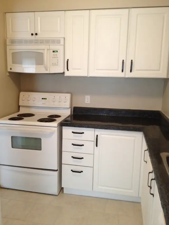 3 Beds,2 Bath,Finished Basemenr,Appliances,A.C.Garage,Patio,Town