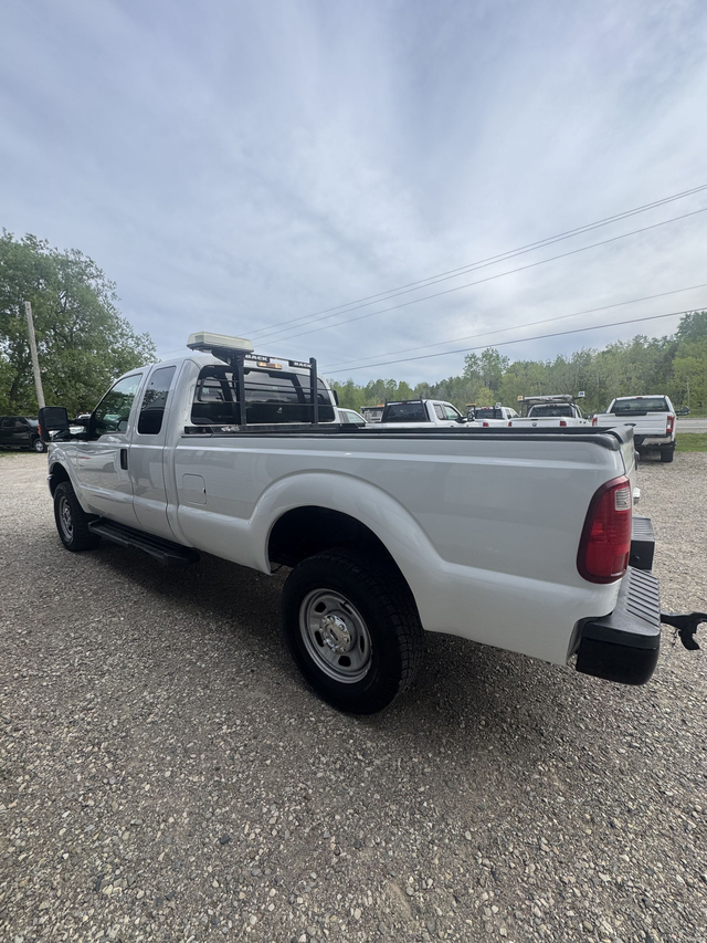 2014 Ford Super Duty F-250 SRW EXTENDED CAB — 8 FT BOX — CERTIFI - Photo 4