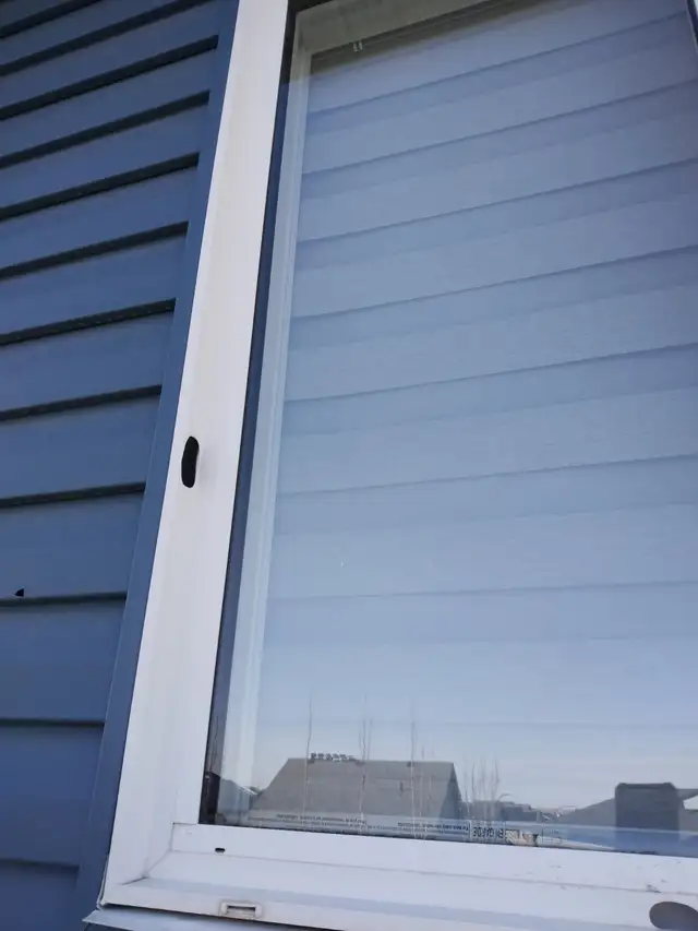 Vinyl Window Frame and glass repair after the hail damage