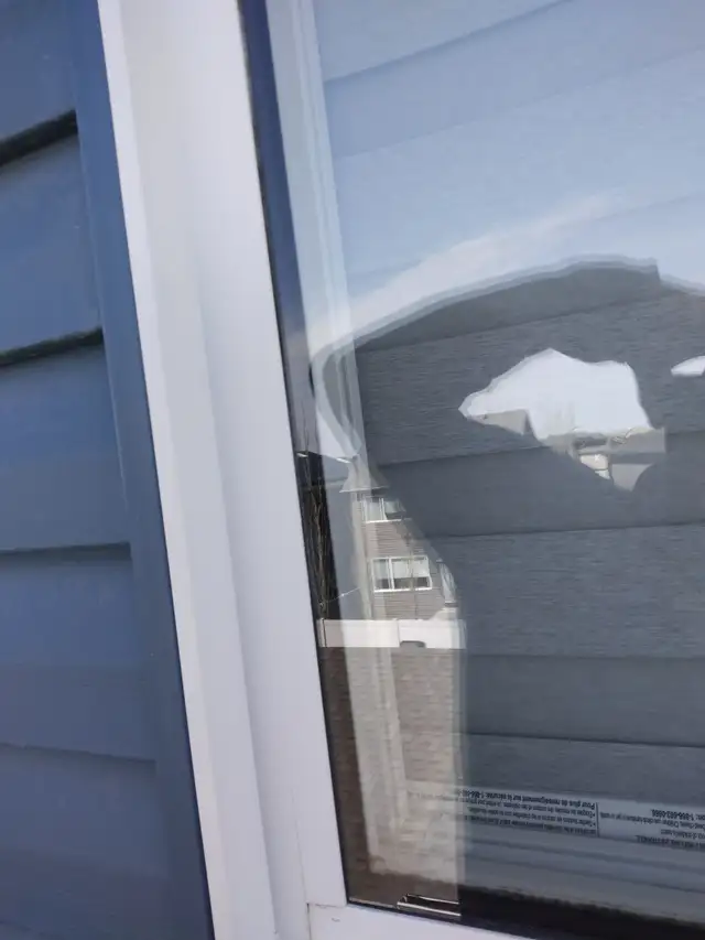 Vinyl Window Frame and glass repair after the hail damage - Photo 2