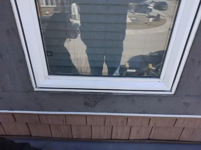Vinyl Window Frame and glass repair after the hail damage - Photo 4