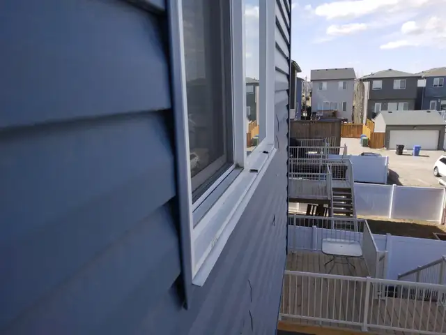 Vinyl Window Frame and glass repair after the hail damage - Photo 5