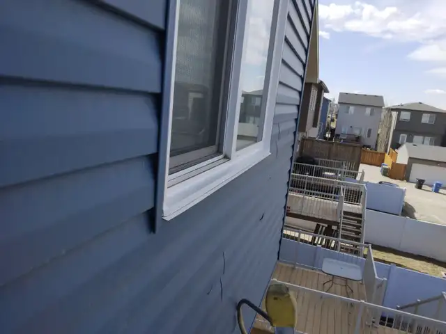 Vinyl Window Frame and glass repair after the hail damage - Photo 6