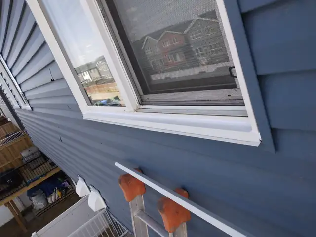 Vinyl Window Frame and glass repair after the hail damage - Photo 8