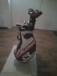 LEFT HAND GAUCHER TAYLORMADE GOLF BAG AND IRONS-CALLAWAY DRIVER