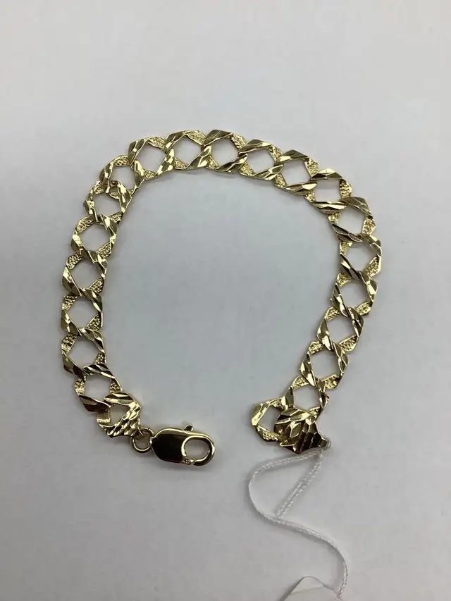bracelet en or a grandes mailles