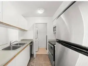 2 Bedroom   Den & underground secured parking Avail immediately - Photo 13