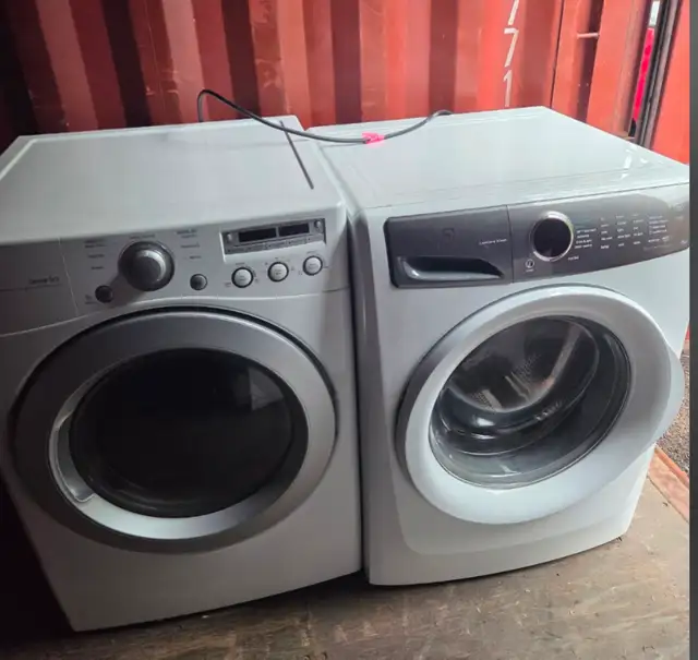 white Electolux washing machine and LG electric dryer for sale.