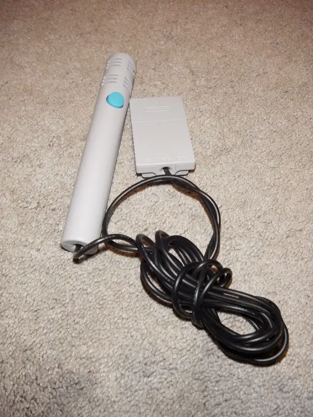 NINTENDO GAMECUBE MICROPHONE, $40.