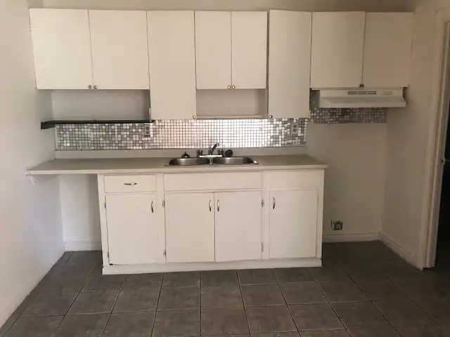 ELLIOT LAKE: 2 BR townhouse w/ yard & parking