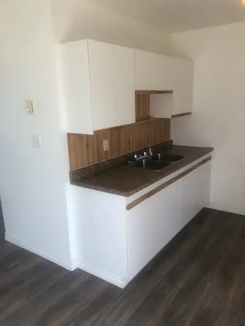 ELLIOT LAKE: 3 BR townhouse w garage, yard, basement
