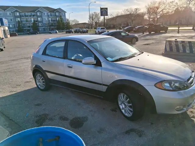 Safetied 2005 Chevy Optra - Photo 6
