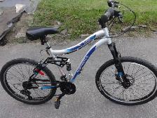 VÉLO À DOUBLE SUSPENSION, SUPERCYCLE MODEL RADEX 24. PROPRE. - Photo 2